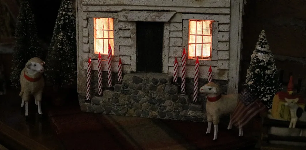 Meeting House showing Clapboard Siding with Candles Lights Up