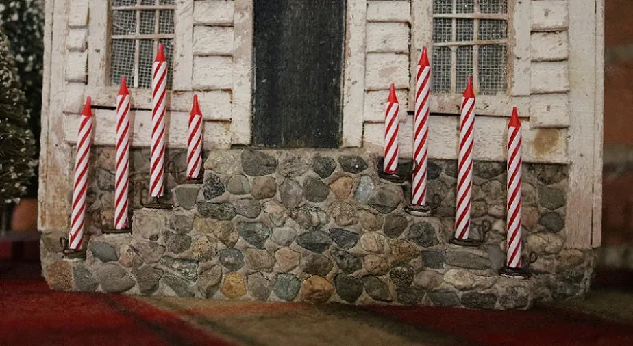 Meeting House showing Clapboard Siding with Candles Lights Up